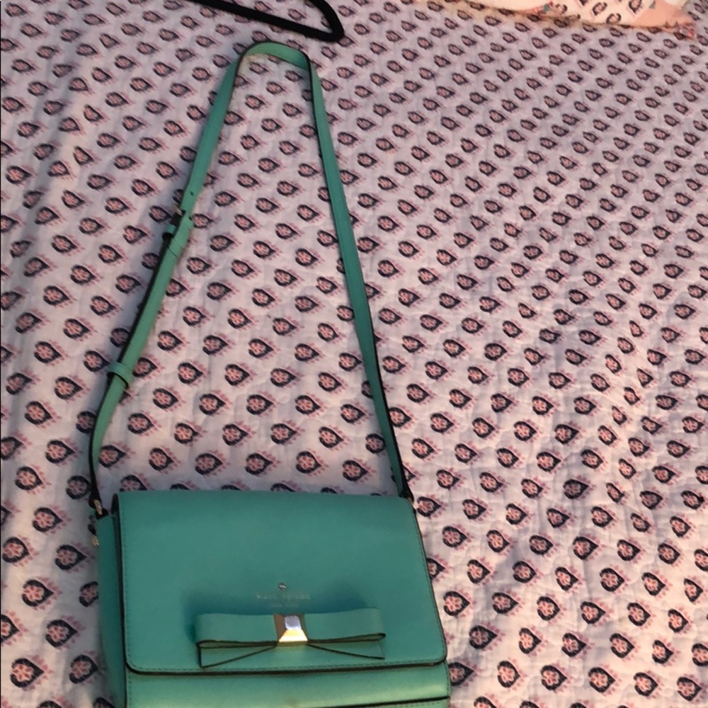 light blue Kate spade cross body purse